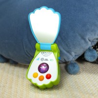 BABY EINSTEIN Hračka hudební telefon Shell Phone™ 6m+