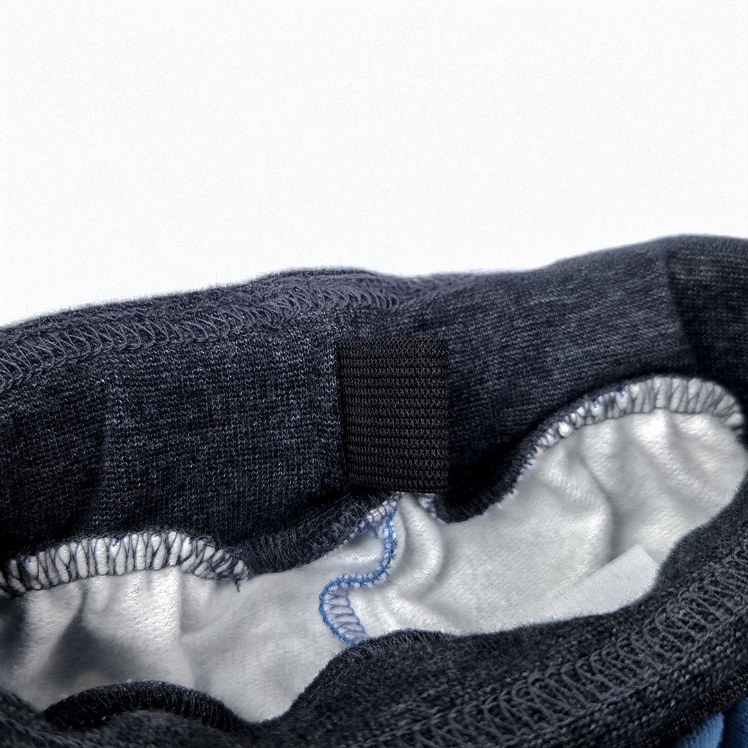 LITTLE ANGEL Tepláky - denim lvíčci