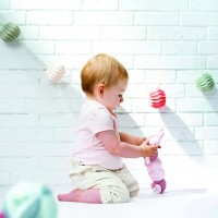 NATTOU Hračka housenka edukační 4 aktivity Lapidou pink