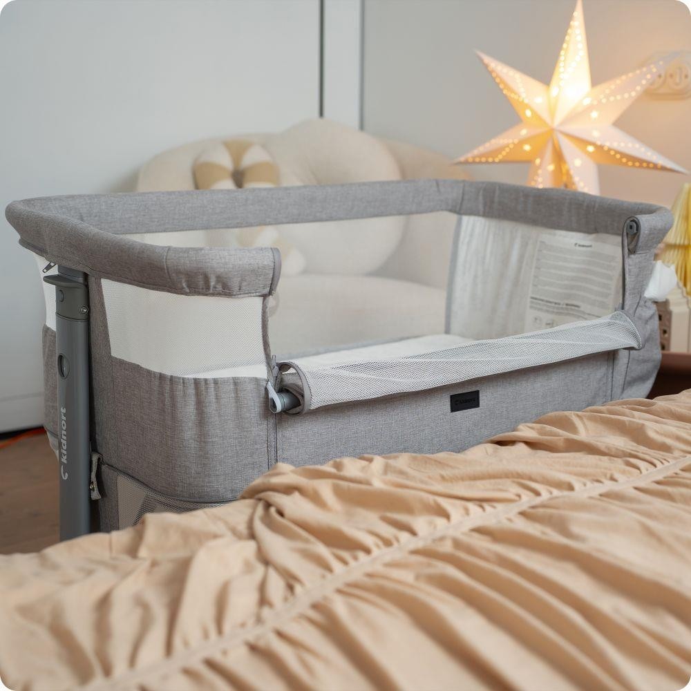 KIDNORT Postýlka Snäckskal