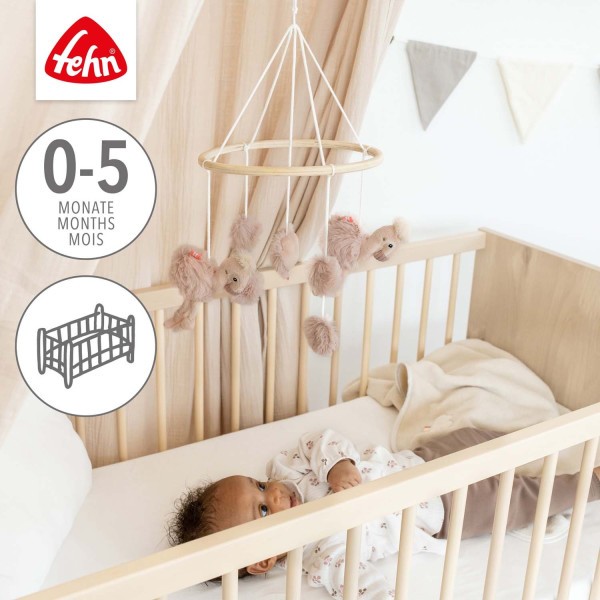 BABY FEHN Dřevěný kolotoč plameňák